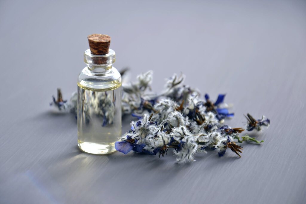 Selective Focus Photo of Bottle With Cork Lid essential oil blend for sleep
